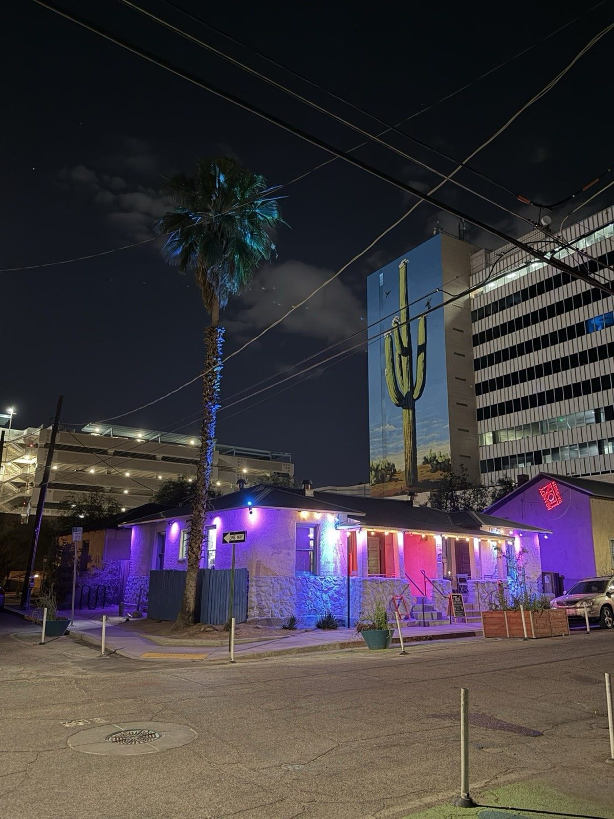 The Brandylion building corner lit at night