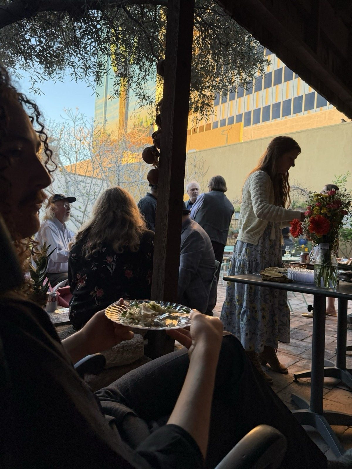 A golden-hour gathering with the downtown Tucson skyline behind